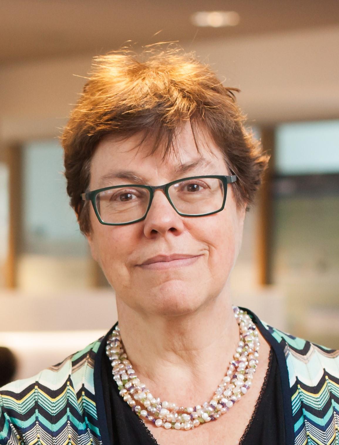 A picture of Liesbet van zoonen, a close up picture of a woman with short, dark hair wearing glasses